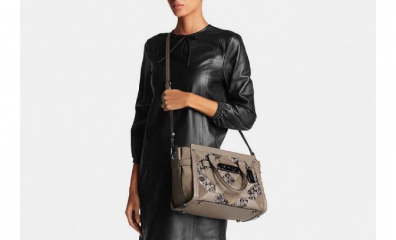 55% OFF!  COACH Swagger $309.99