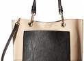 51% off!  Calvin Klein Reversible Pocket Novelty Tote $63.13